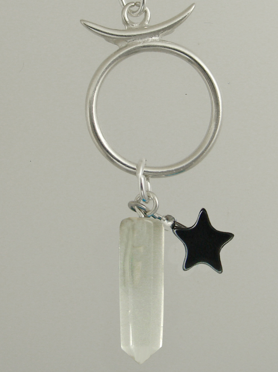 Sterling Silver Taurus Pendant Necklace With an Clear Crystal And a Black Onyx Star